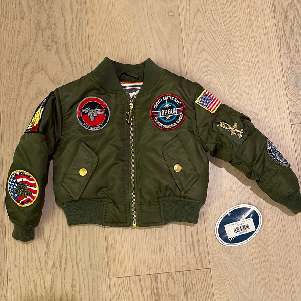 New with tags Up and Away Top Gun inspired junior flight jacket. Sz 18 mos